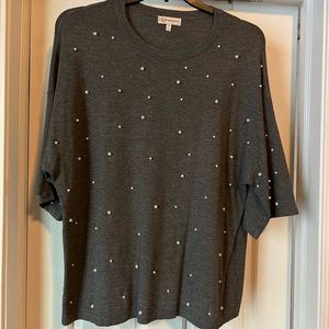 60% viscose, 40% nylon-very soft!  Hand wash.